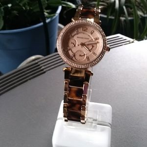 Micheal kors rose gold watch with tortoise band and crystal bezel